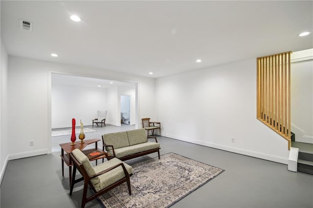 living room with concrete floors