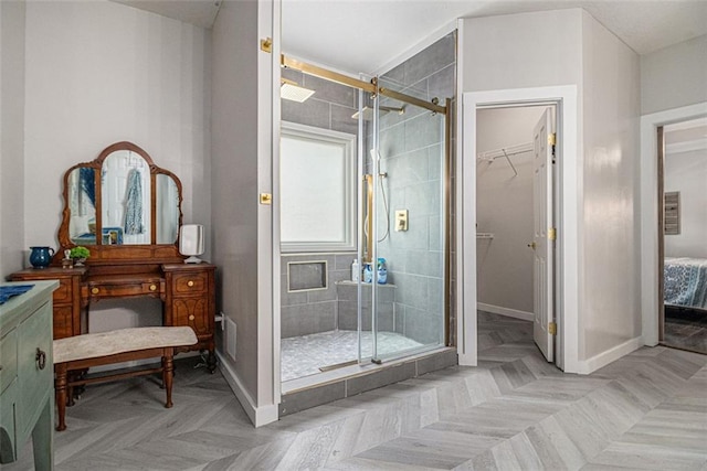 232 Christian Cir, Carrollton, GA 30116 - full bathroom featuring baseboards, a shower stall, a spacious closet, and vanity