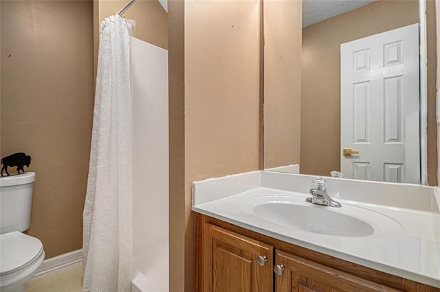232 Christian Cir, Carrollton, GA 30116 - full bathroom with toilet, vanity, a shower with curtain, and baseboards