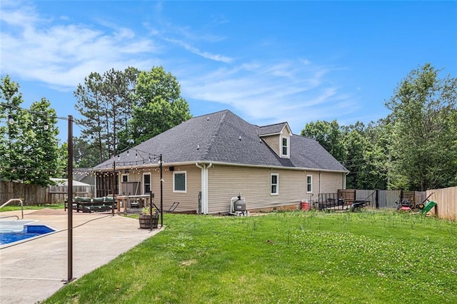 232 Christian Cir, Carrollton, GA 30116 - rear view of house featuring a patio and a shingled roof