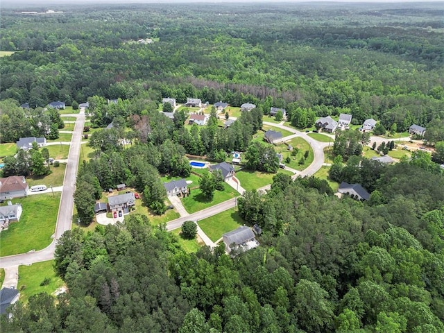 232 Christian Cir, Carrollton, GA 30116 - aerial view of property and surrounding area featuring a heavily wooded area