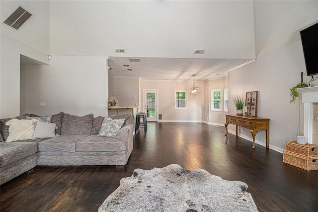 232 Christian Cir, Carrollton, GA 30116 - living area featuring wood finished floors, a fireplace, and baseboards