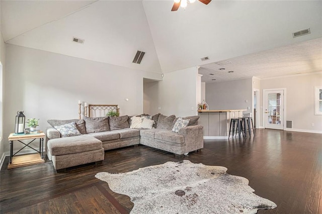 232 Christian Cir, Carrollton, GA 30116 - living room with a ceiling fan, dark wood-type flooring, high vaulted ceiling, and baseboards
