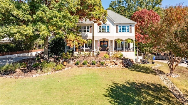 view of front of home with a front lawn