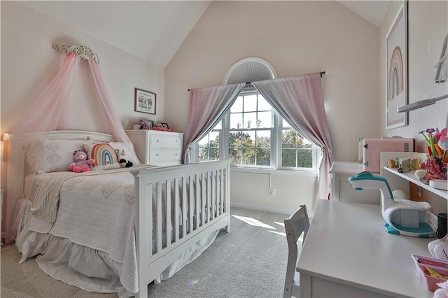 bedroom featuring light carpet and lofted ceiling