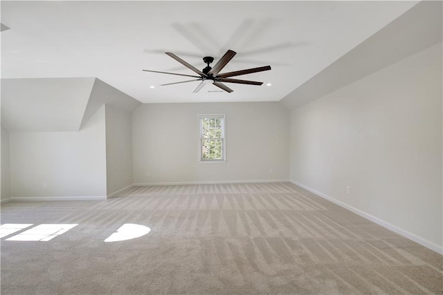 bonus room featuring vaulted ceiling, ceiling fan, and light carpet