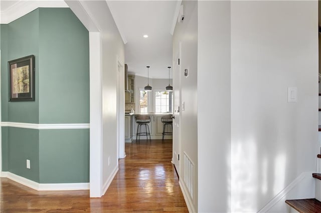 corridor featuring hardwood / wood-style flooring