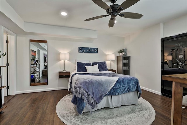 bedroom featuring ceiling fan and dark wood-type flooring