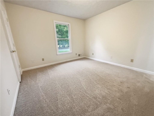 unfurnished room with carpet