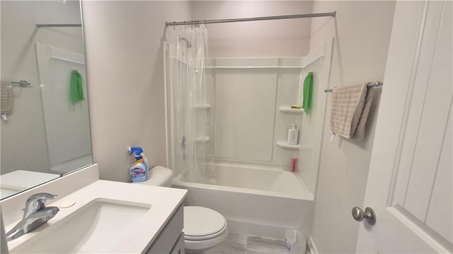 bathroom featuring shower / tub combo, vanity, and toilet