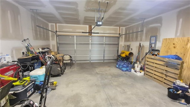 garage featuring a garage door opener