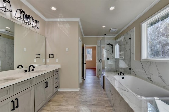 bathroom featuring a sink, a marble finish shower, a bath, double vanity, and crown molding