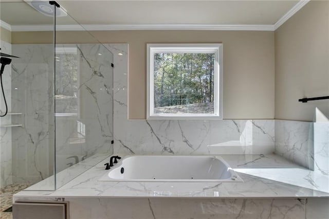 full bath featuring a garden tub, a marble finish shower, and ornamental molding