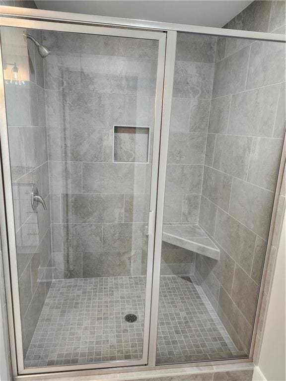 bathroom with a stall shower