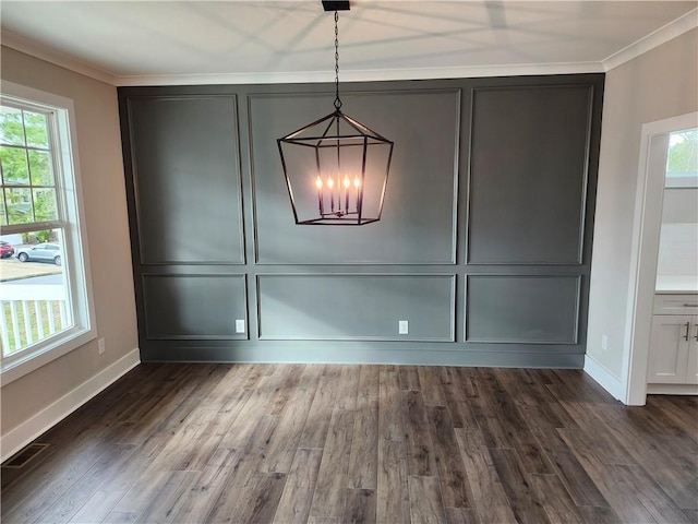 unfurnished dining area featuring plenty of natural light, visible vents, and a decorative wall