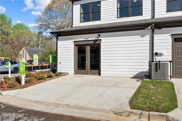 property entrance with central air condition unit