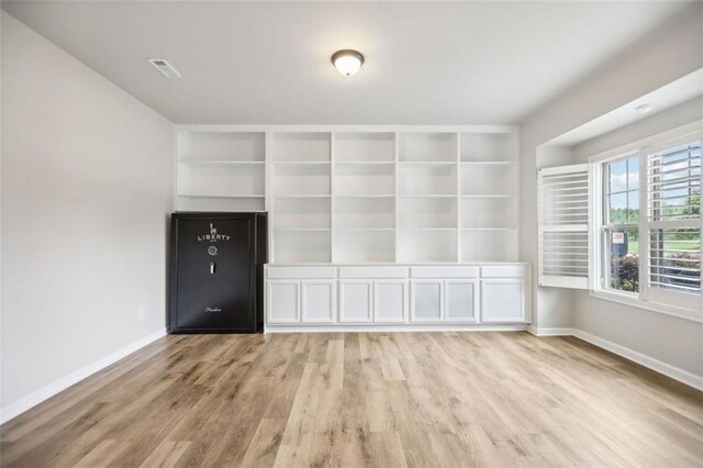 unfurnished living room featuring light hardwood / wood-style floors