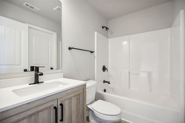 full bathroom with vanity, shower / bathing tub combination, and toilet