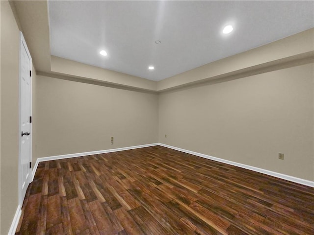 unfurnished room featuring dark hardwood / wood-style floors