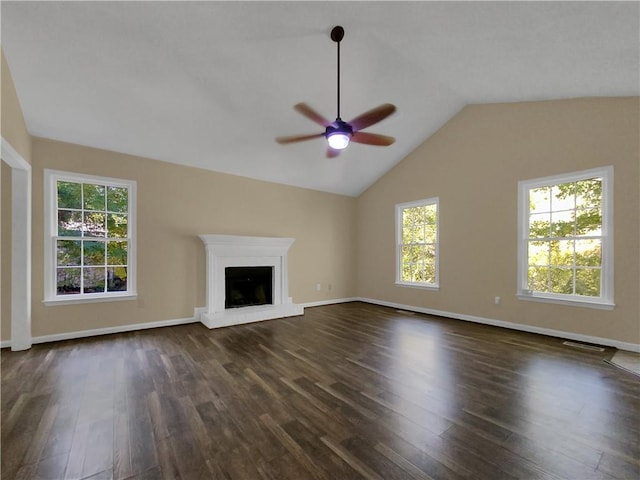 unfurnished living room featuring ceiling fan, lofted ceiling, and dark hardwood / wood-style flooring