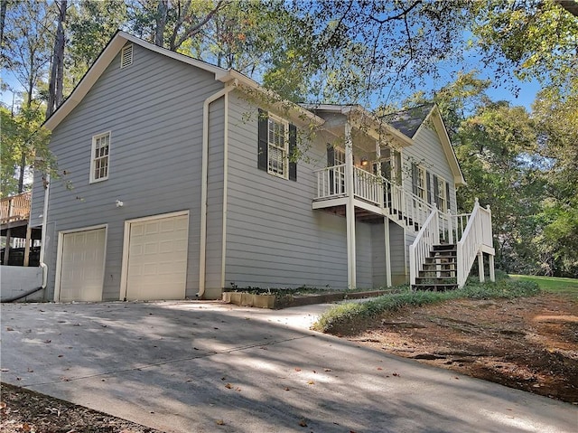 view of side of home featuring a garage