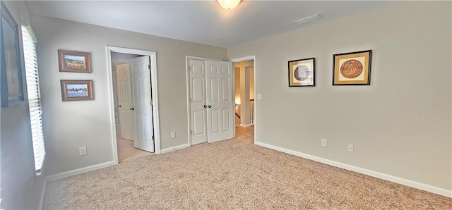 4230 Glen Vista Ct, Duluth, GA 30097 - unfurnished bedroom with light colored carpet, baseboards, and multiple windows