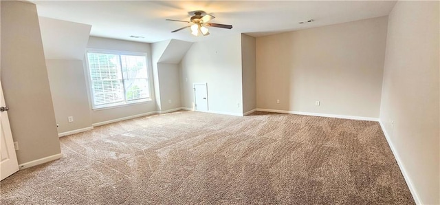 4230 Glen Vista Ct, Duluth, GA 30097 - bonus room featuring carpet floors, ceiling fan, baseboards, and lofted ceiling