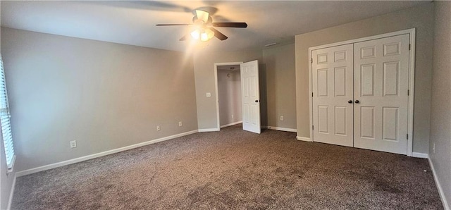 4230 Glen Vista Ct, Duluth, GA 30097 - unfurnished bedroom with dark carpet, ceiling fan, and baseboards