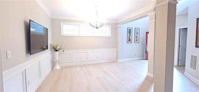 4230 Glen Vista Ct, Duluth, GA 30097 - unfurnished dining area with a chandelier, light wood-style flooring, crown molding, and decorative columns