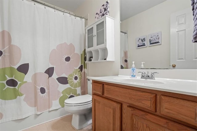 full bathroom with tile patterned floors, vanity, toilet, and shower / bath combo