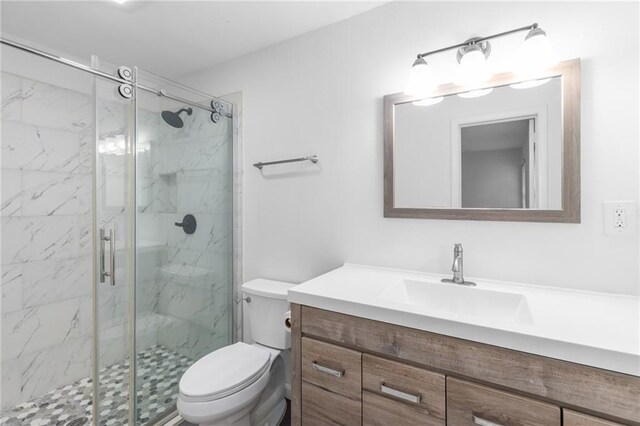 1966 Briarwood Dr, Gainesville, GA 30501 - bathroom featuring vanity, a marble finish shower, and toilet