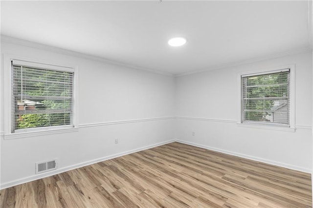 1966 Briarwood Dr, Gainesville, GA 30501 - unfurnished room with crown molding, light wood finished floors, and baseboards