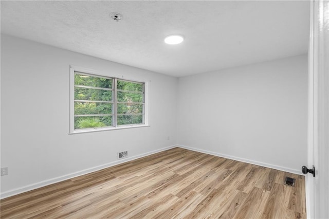 1966 Briarwood Dr, Gainesville, GA 30501 - unfurnished room with light wood-type flooring, baseboards, and fire sprinkler in ceiling