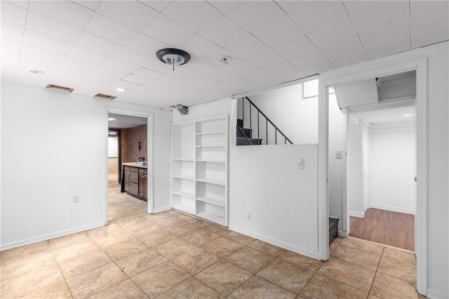 1966 Briarwood Dr, Gainesville, GA 30501 - unfurnished room with stairway, built in features, and baseboards