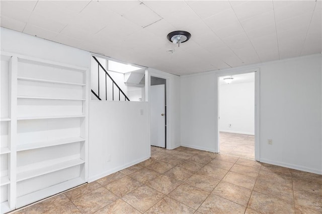 1966 Briarwood Dr, Gainesville, GA 30501 - empty room featuring stairway, baseboards, and built in shelves