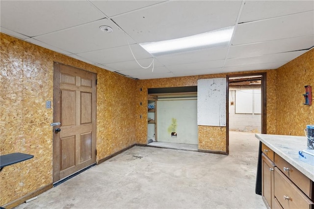1966 Briarwood Dr, Gainesville, GA 30501 - unfurnished room featuring a paneled ceiling and unfinished concrete flooring