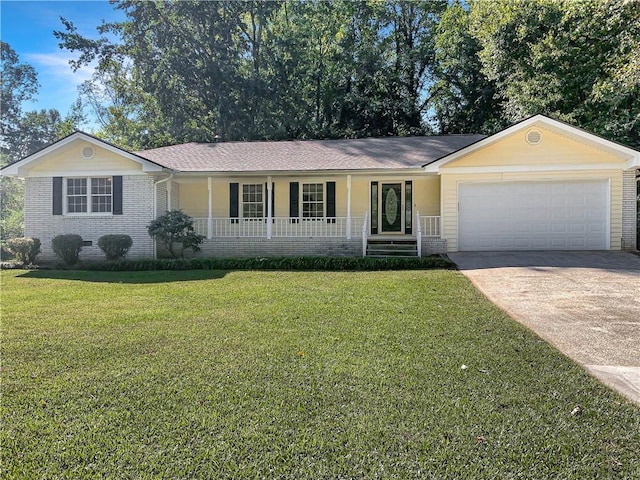 single story home featuring covered porch, a front yard, and a garage