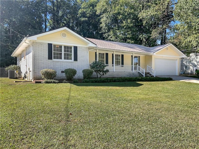 ranch-style house featuring central AC unit, a garage, a front yard, and covered porch