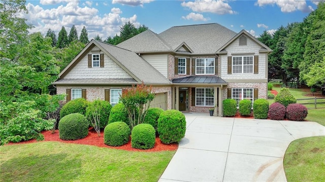 3120 Caney Creek Ln, Cumming, GA 30041 - view of front of home with an attached garage, brick siding, and a front lawn
