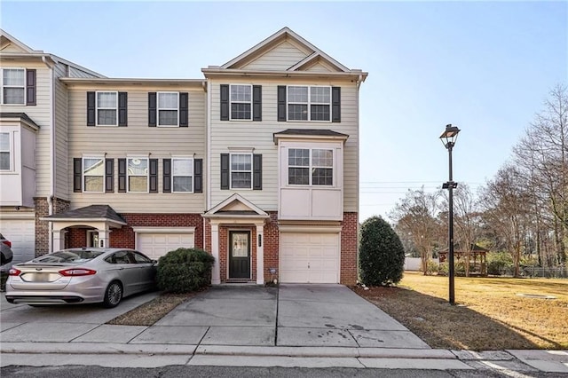 multi unit property featuring a garage