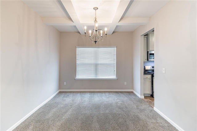 spare room featuring coffered ceiling, baseboards, beamed ceiling, carpet, and an inviting chandelier