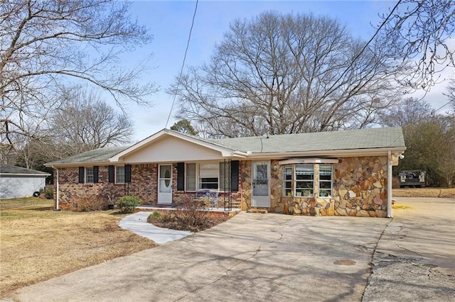 ranch-style house with covered porch