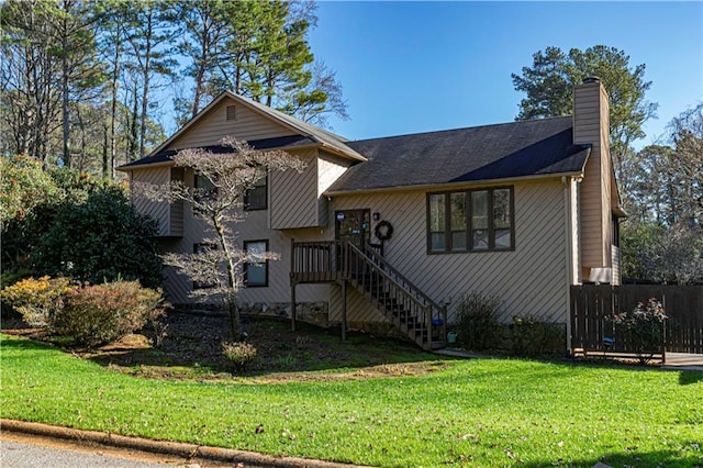 split level home with a front yard