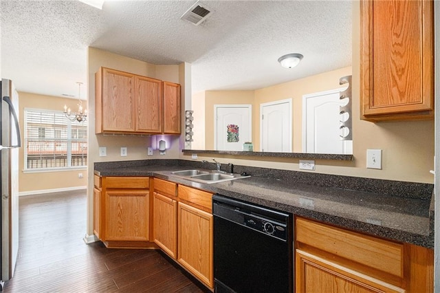 3262 Cascade Parc Blvd, Atlanta, GA 30311 - kitchen with black dishwasher, dark wood-style flooring, a chandelier, dark countertops, and a textured ceiling