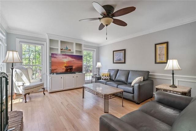 4423 Windsor Oaks Cir, Marietta, GA 30066 - living area with ornamental molding, light wood-style flooring, healthy amount of natural light, and a ceiling fan