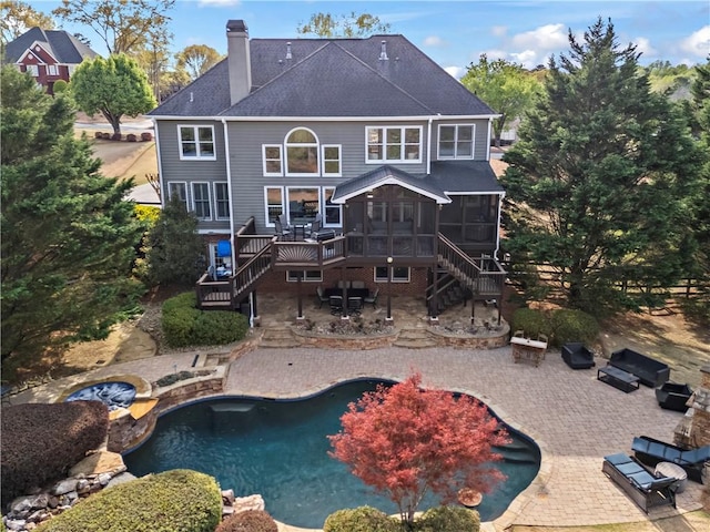 410 Hickory Fairway Ct, Woodstock, GA 30188 - back of house with stairway, a sunroom, a chimney, and an outdoor fire pit