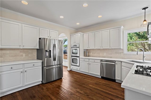 410 Hickory Fairway Ct, Woodstock, GA 30188 - kitchen featuring stainless steel appliances, a sink, healthy amount of natural light, white cabinets, and recessed lighting