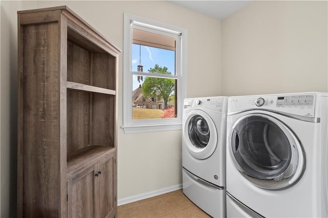 410 Hickory Fairway Ct, Woodstock, GA 30188 - washroom with independent washer and dryer, light tile patterned floors, and baseboards