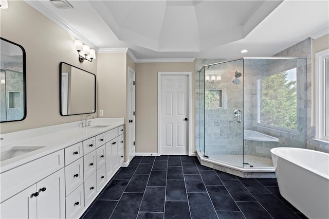 410 Hickory Fairway Ct, Woodstock, GA 30188 - full bathroom with a freestanding tub, double vanity, a stall shower, a tray ceiling, and crown molding