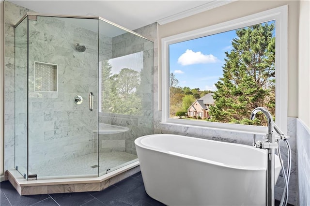 410 Hickory Fairway Ct, Woodstock, GA 30188 - full bathroom featuring a soaking tub, a shower stall, tile walls, ornamental molding, and tile patterned floors